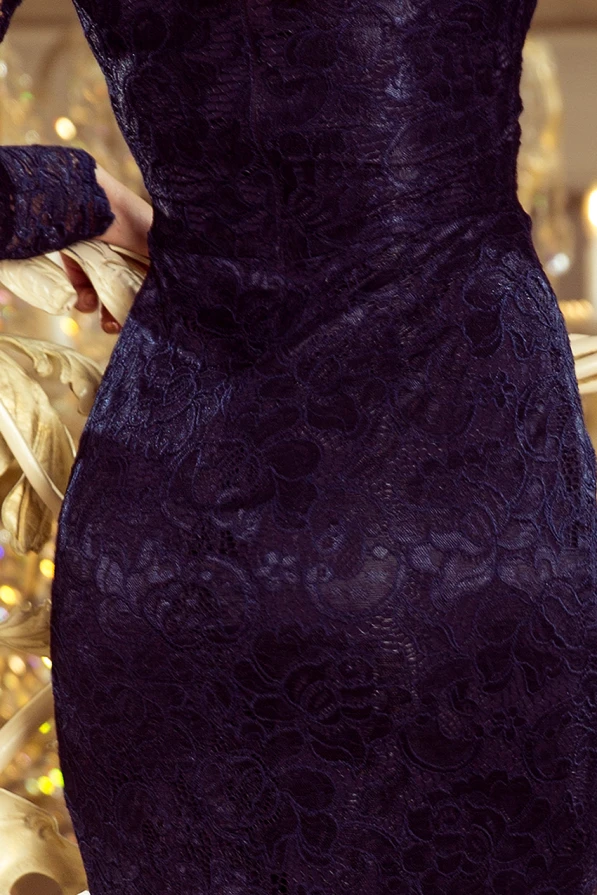A close-up of an elegant, dark lace dress showcasing intricate floral patterns and a form-fitting silhouette. The rich texture and deep color add a touch of sophistication and luxury.
