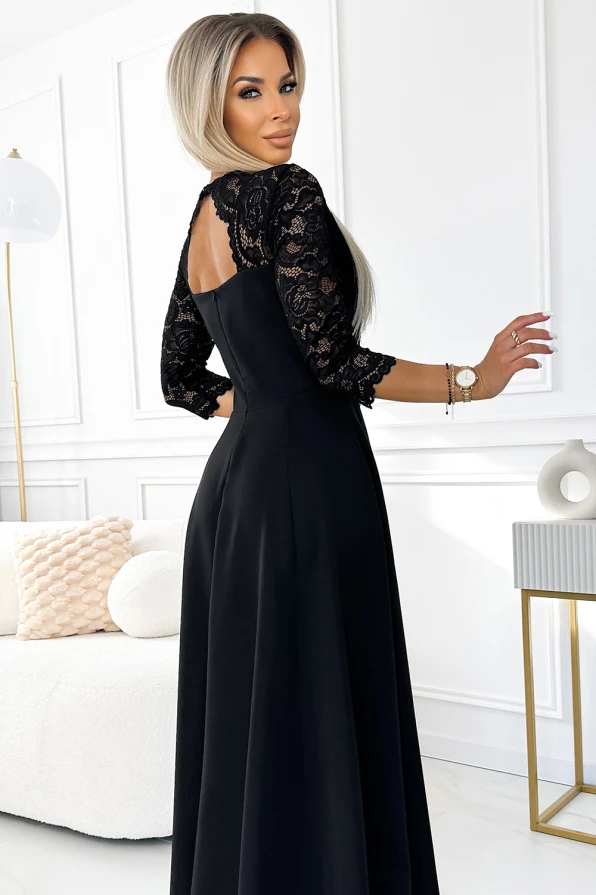 Elegant black evening gown featuring a fitted bodice with intricate lace sleeves and a flowing long skirt. The dress exudes sophistication, perfect for formal occasions or special events.