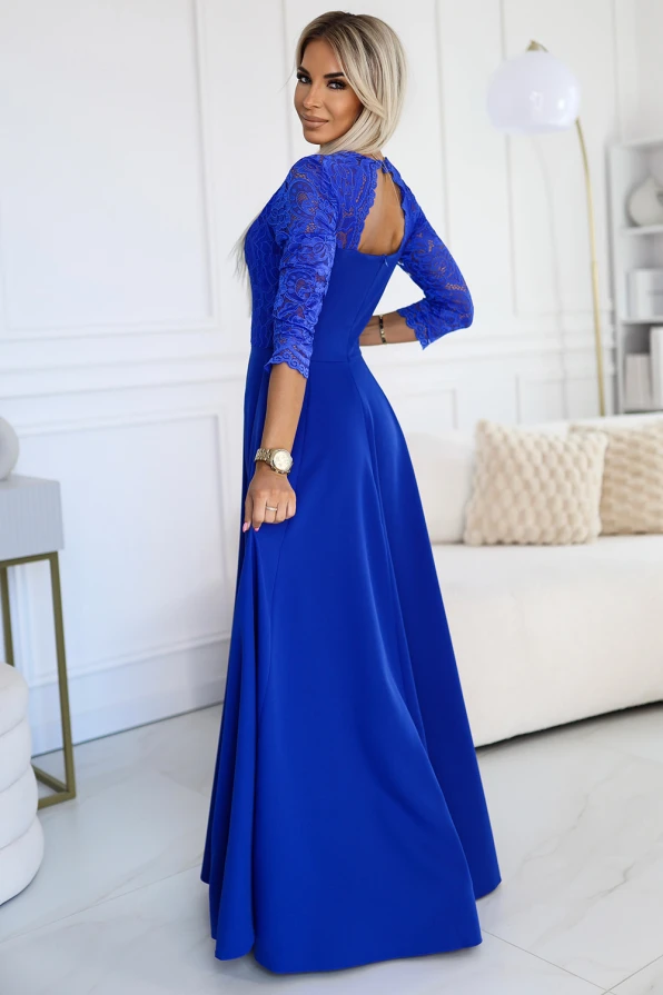 A long, elegant blue dress features a fitted bodice with intricate lace detailing on the sleeves and upper back. The flowing skirt adds a touch of sophistication, perfect for formal occasions.