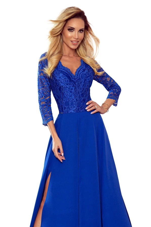 A stunning royal blue evening gown featuring a delicate lace bodice with three-quarter sleeves and a deep V-neckline. The flowing skirt includes a stylish slit, adding a touch of elegance and sophistication.