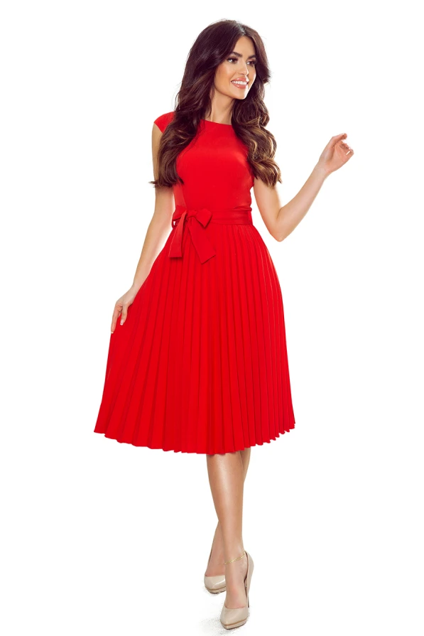 A vibrant red pleated dress with a fitted bodice and a matching waist tie, creating an elegant silhouette. The dress falls to a midi length, perfect for both formal and semi-formal occasions.