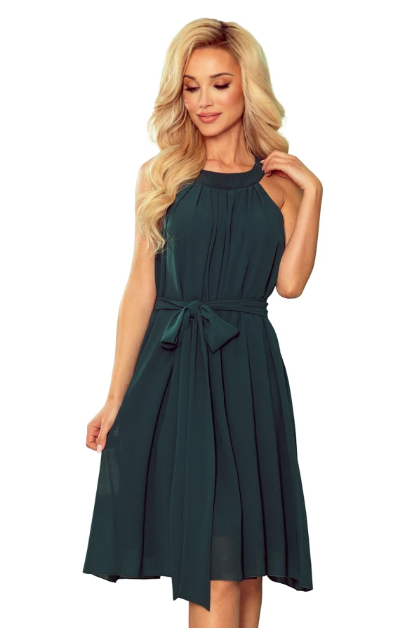 A sleeveless, dark green chiffon dress features a pleated design with a high neckline and a matching waist tie. The knee-length dress exudes elegance and is perfect for both casual and formal occasions.