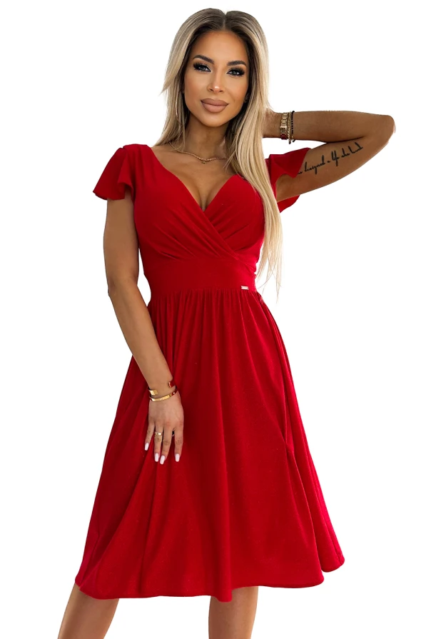 A vibrant red dress with a flattering V-neckline and short flutter sleeves, perfect for elegant occasions. The dress features a fitted waist and a flowing skirt, offering both comfort and style.