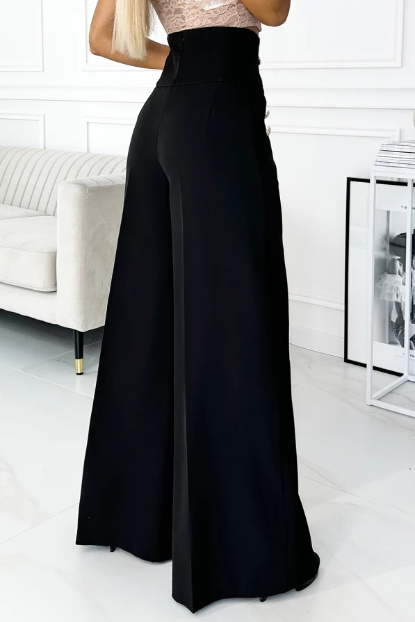 Wide-leg black trousers with a high waist, designed for an elegant and sophisticated look. The fabric drapes beautifully, offering both comfort and style for various occasions.