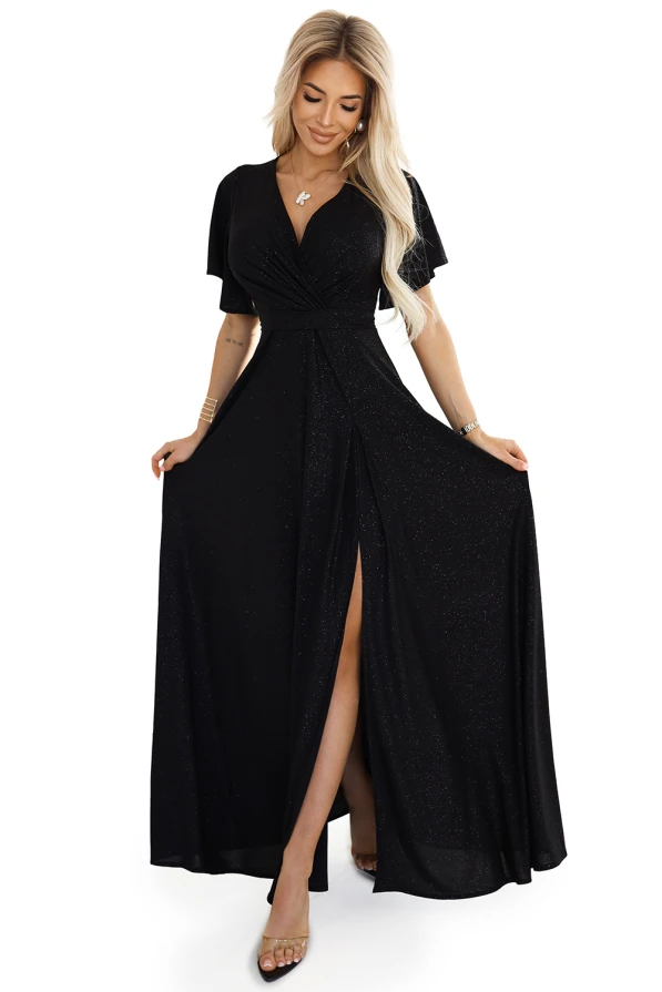 A long, elegant black dress with a shimmering fabric and a deep V-neckline, featuring short sleeves and a high slit for a sophisticated look. The dress is designed to drape beautifully, enhancing the wearer's silhouette.